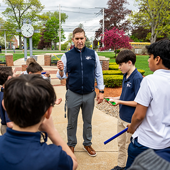 A teacher with a class outside. Links to Donor-Advised Funds A teacher with a class outside. Links to Donor-Advised Funds