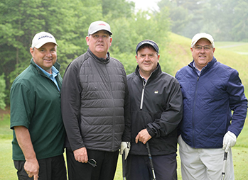 Men playing golf. Link to Life Stage Gift Planner Under Age 60 Situations.